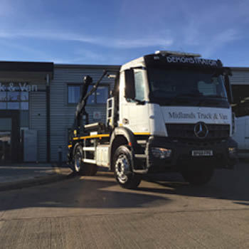 Arocs 1824 Skip loader