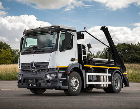 Antos 1824 L 4x2 Rigid - HYVA Skiploader